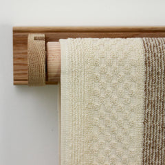 Creamore Mill Oak and Beech Roller Towel Rail with white towel