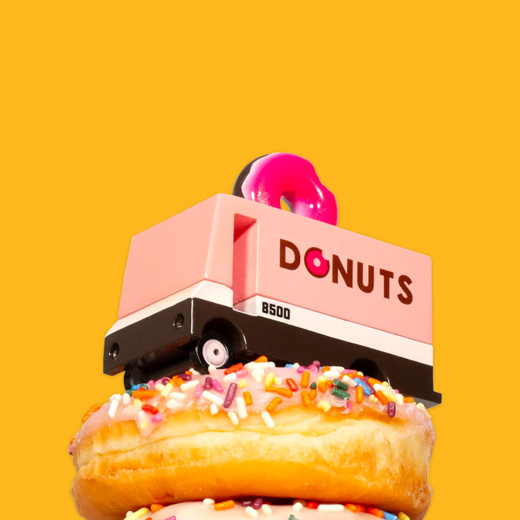 CandyLab Food Truck Van Donut Van on top of a glazed donut